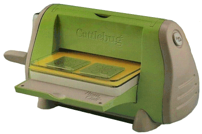 The Cuttlebug, a manual die press machine that uses real dies to cut and emboss paper. Click for bigger photo.