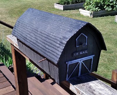 This barn-shaped mailbox gave me the idea of creating a 'See Rock City' barn for my railroad.  Click for bigger photo.
